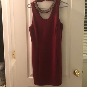 Wine colored, modern chic dress.